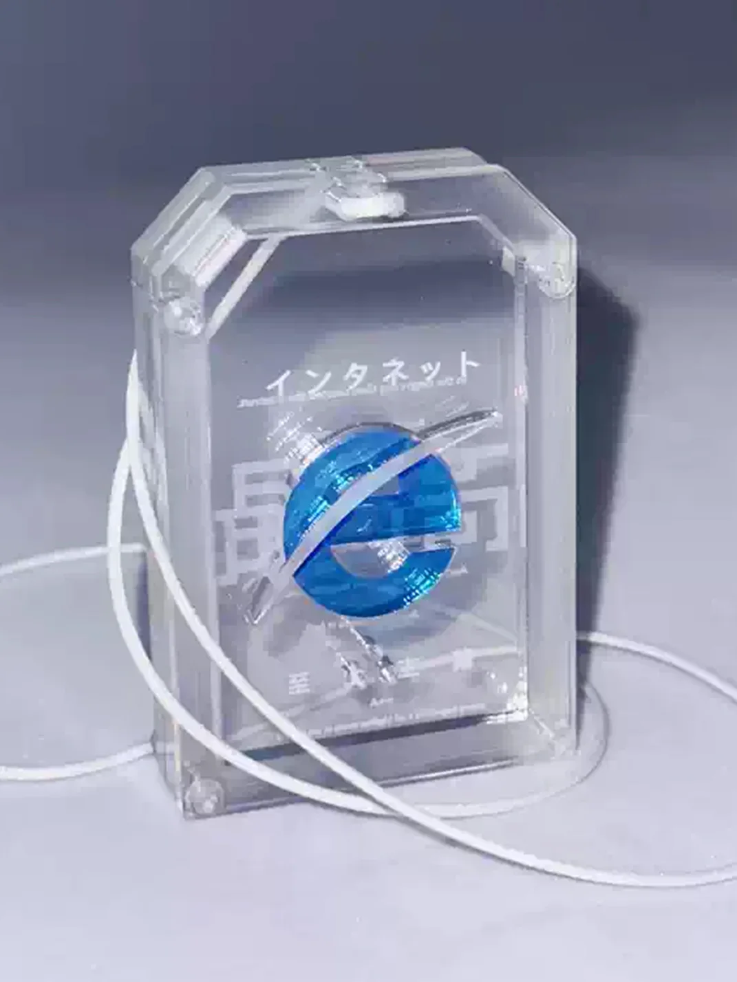 AXBD | Internet Supremacy Transparent Acrylic Omamori Pendant