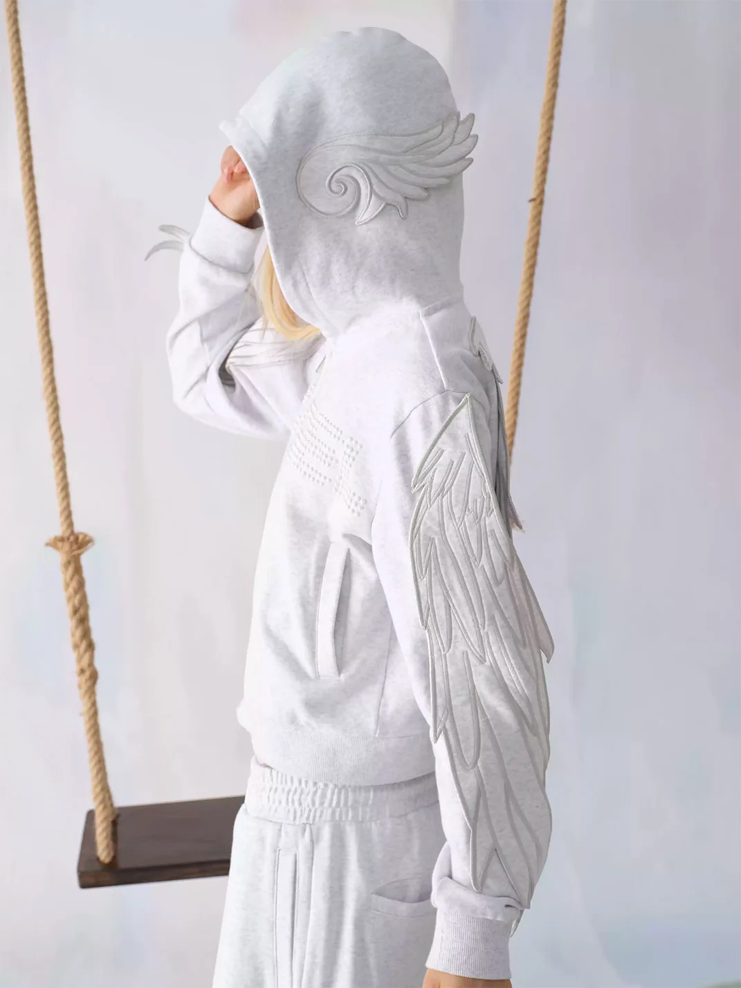 CHAI | Cropped Wing Applique Pearl Zip-Up Hoodie