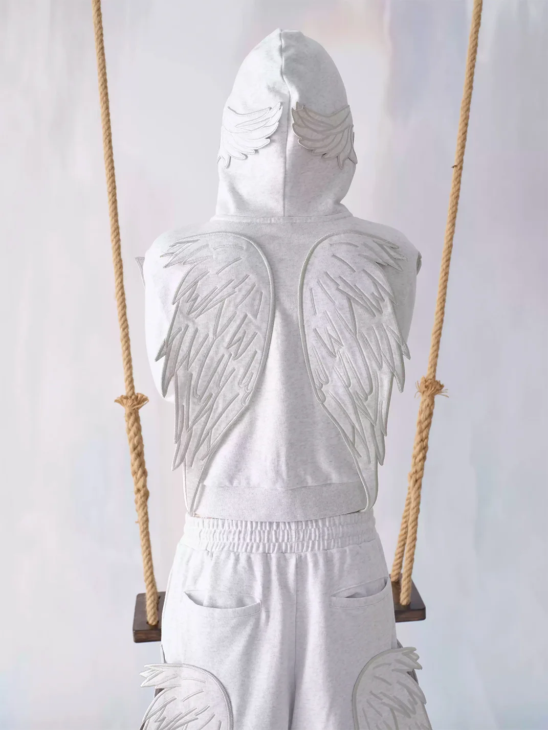 CHAI | Cropped Wing Applique Pearl Zip-Up Hoodie
