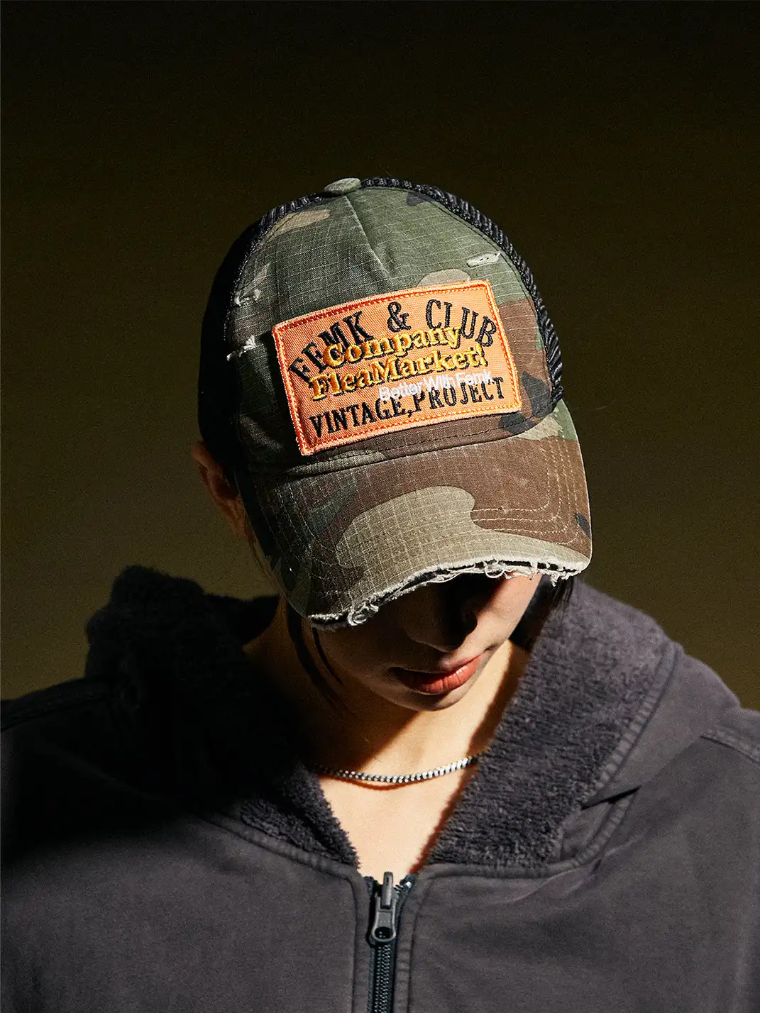 FLEAMARKET | Camo Patchwork Curve Brim Trucker Hat