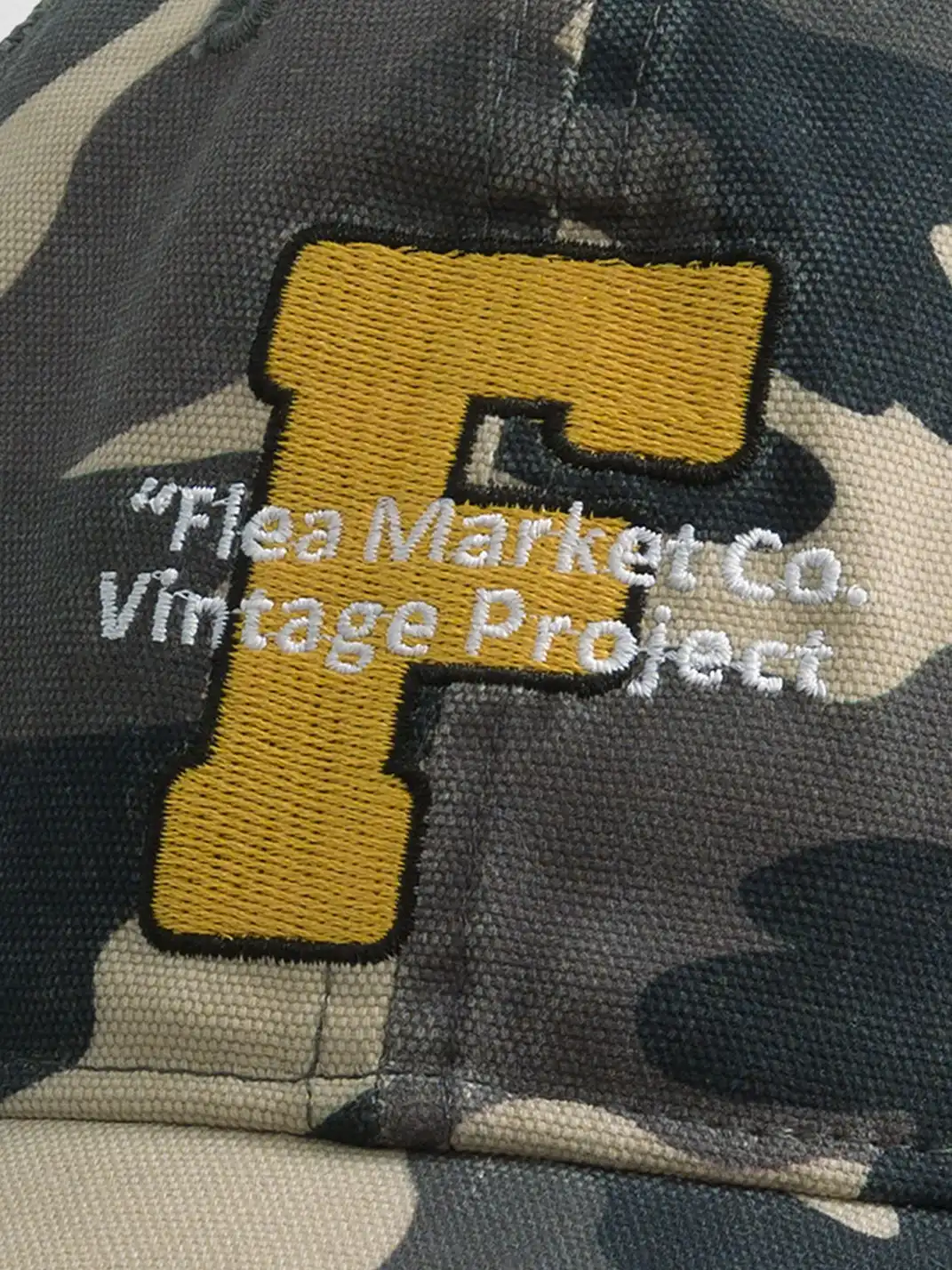 FLEAMARKET | Camo "F" Curve Brim Trucker Hat