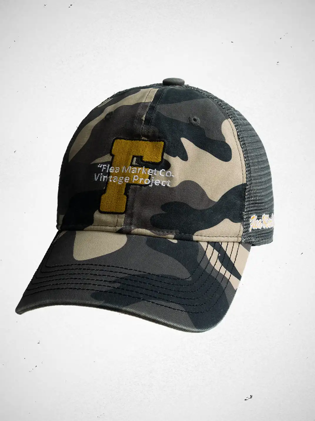 FLEAMARKET | Camo "F" Curve Brim Trucker Hat