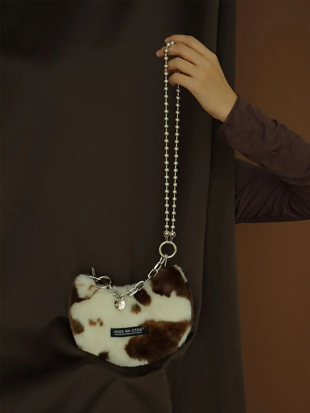 HIDDENNOTES | Furry Cow Print Purse