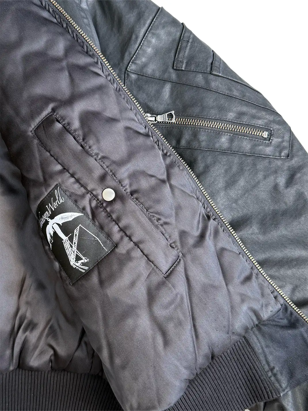 UNKNOWNWORLD | Deconstructed Waxed Wool-Filled Padded Jacket