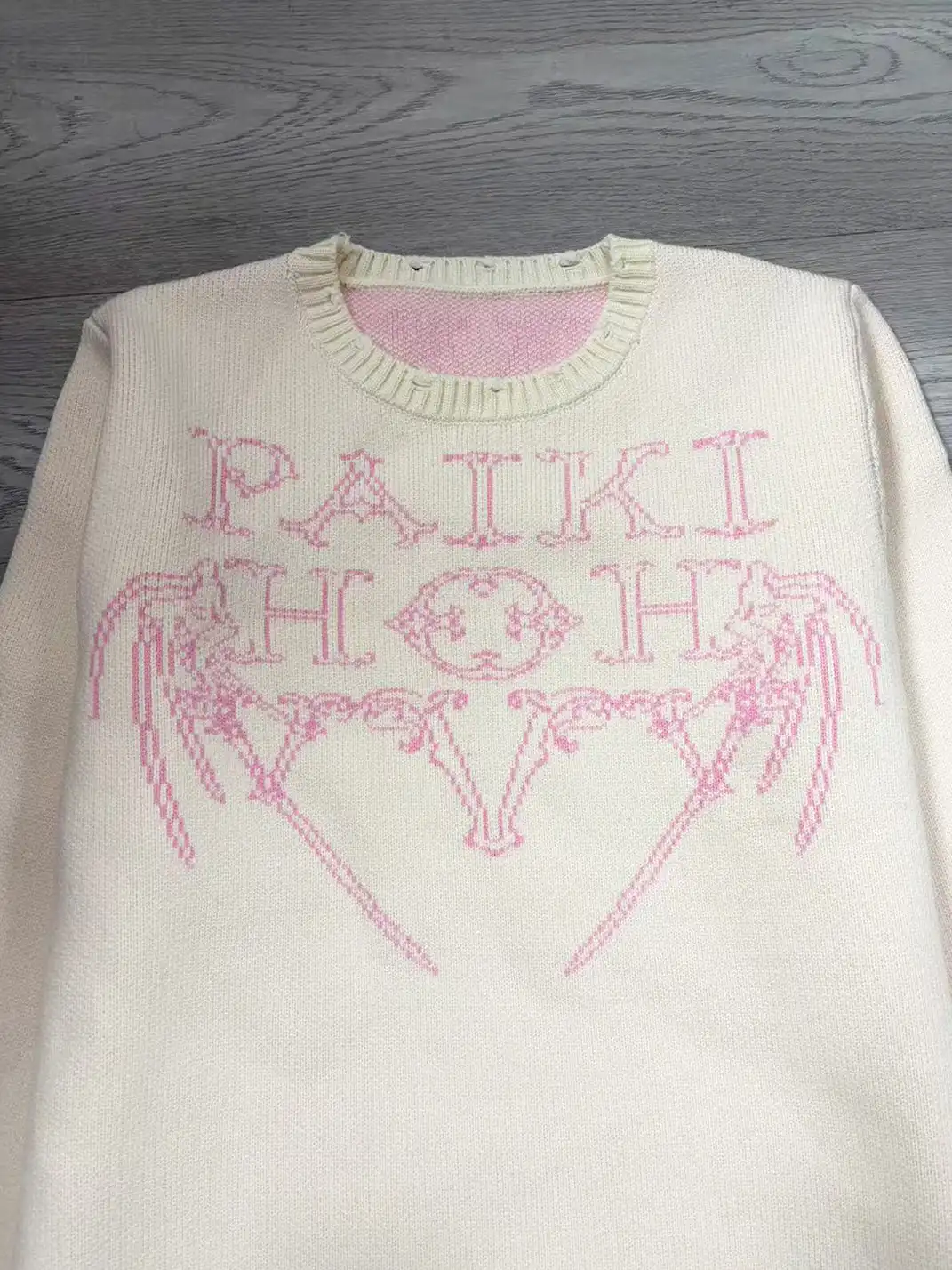 PAIKI | Wing-Shaped Fiery Pattern Distressed Crew Neck Sweater