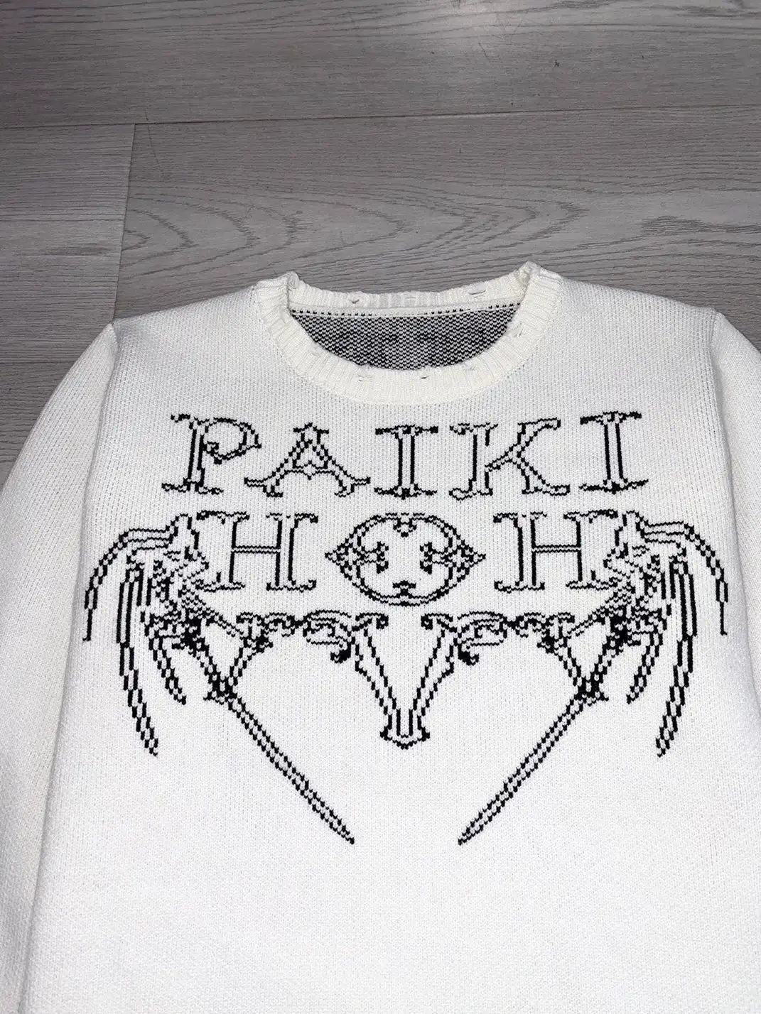 PAIKI | Wing-Shaped Fiery Pattern Distressed Crew Neck Sweater