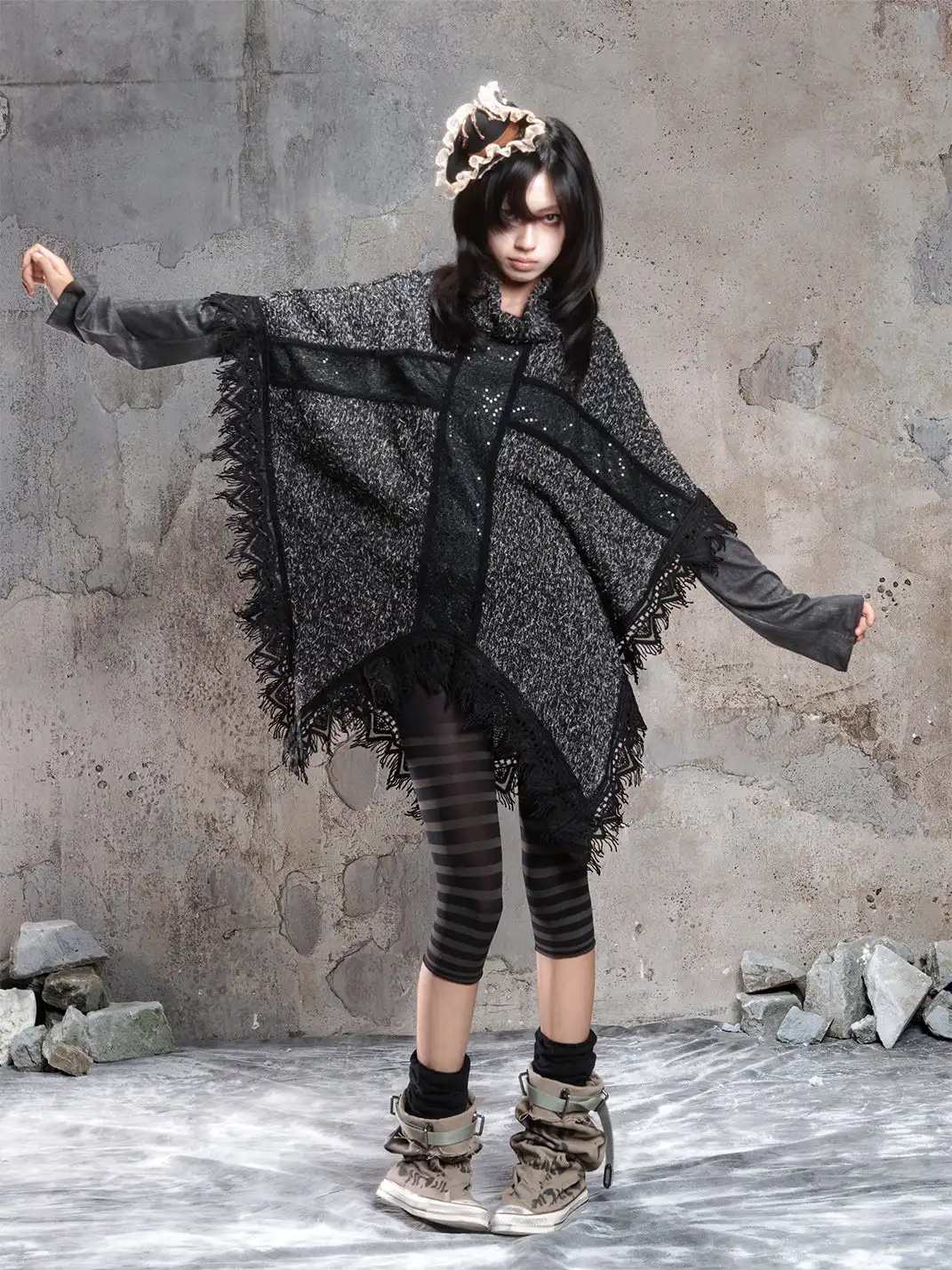 ARIADNAw | Asymmetrical Fringe Detailing on a Niche Knit Top