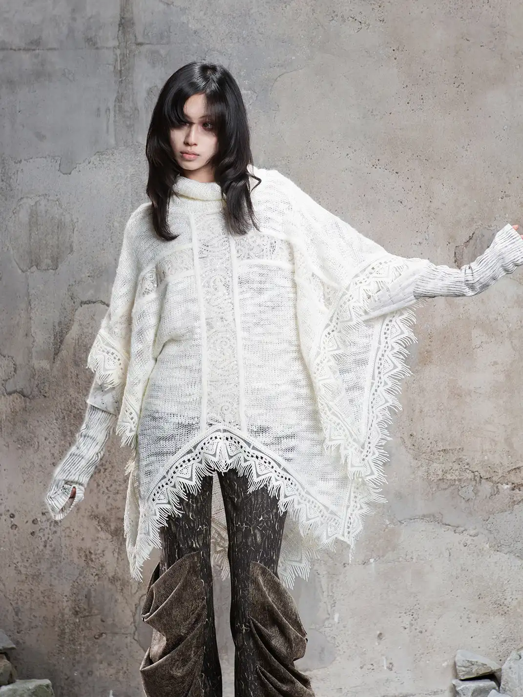 ARIADNAw | Asymmetrical Fringe Detailing on a Niche Knit Top