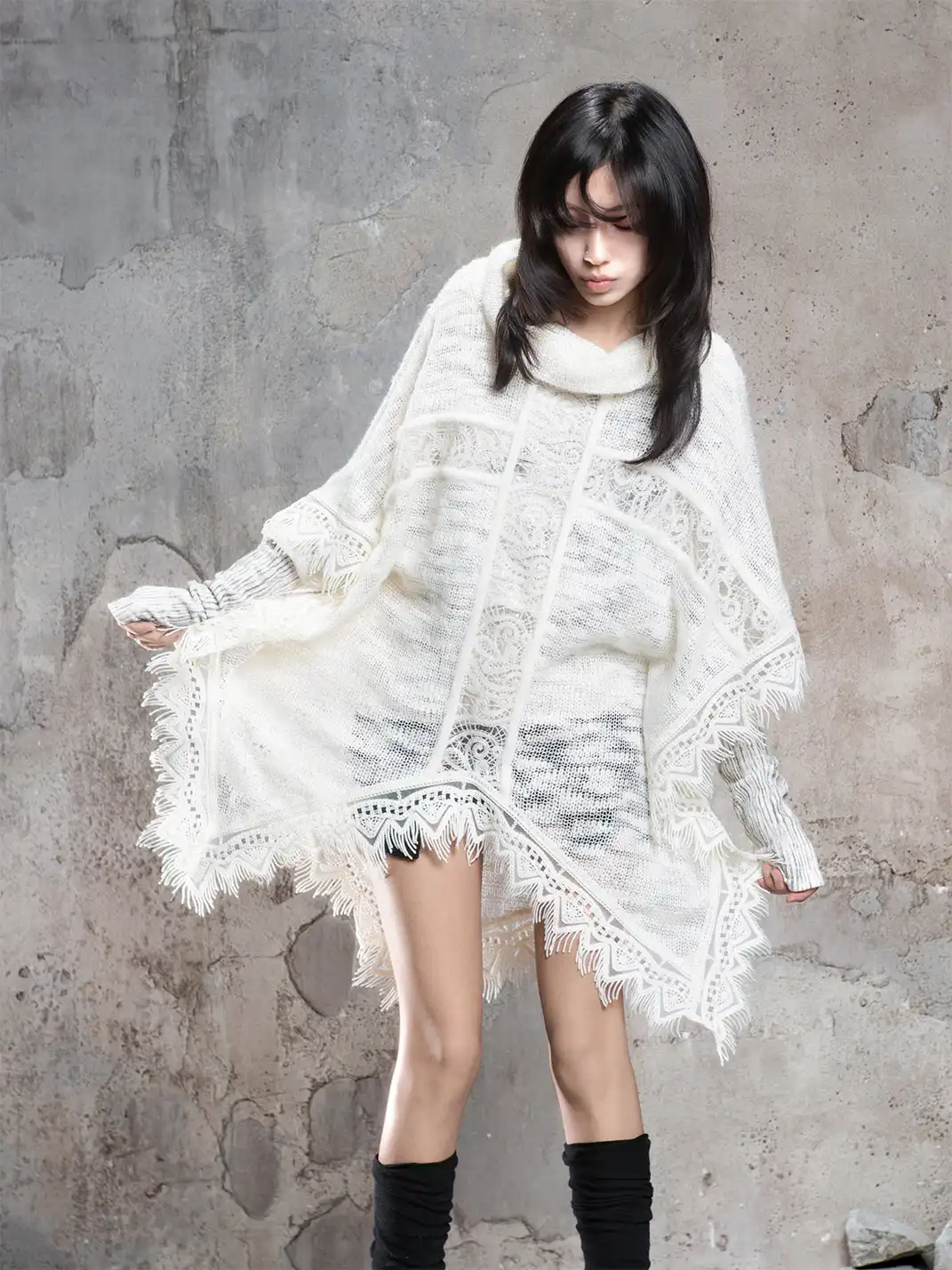 ARIADNAw | Asymmetrical Fringe Detailing on a Niche Knit Top