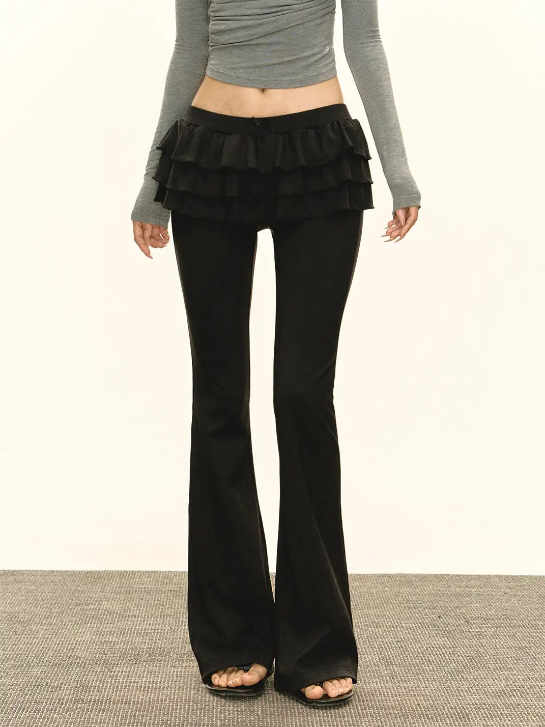 ARISEISM | Faux Two-Piece Ruffled Flared Pants