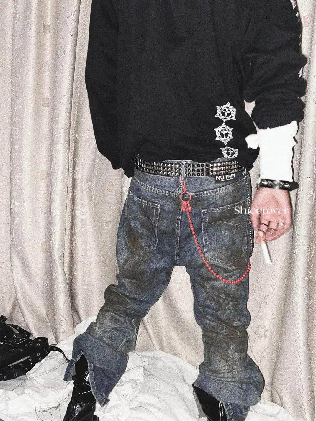 Laukerward | Bloodstained And Tattered Jeans By War Criminals