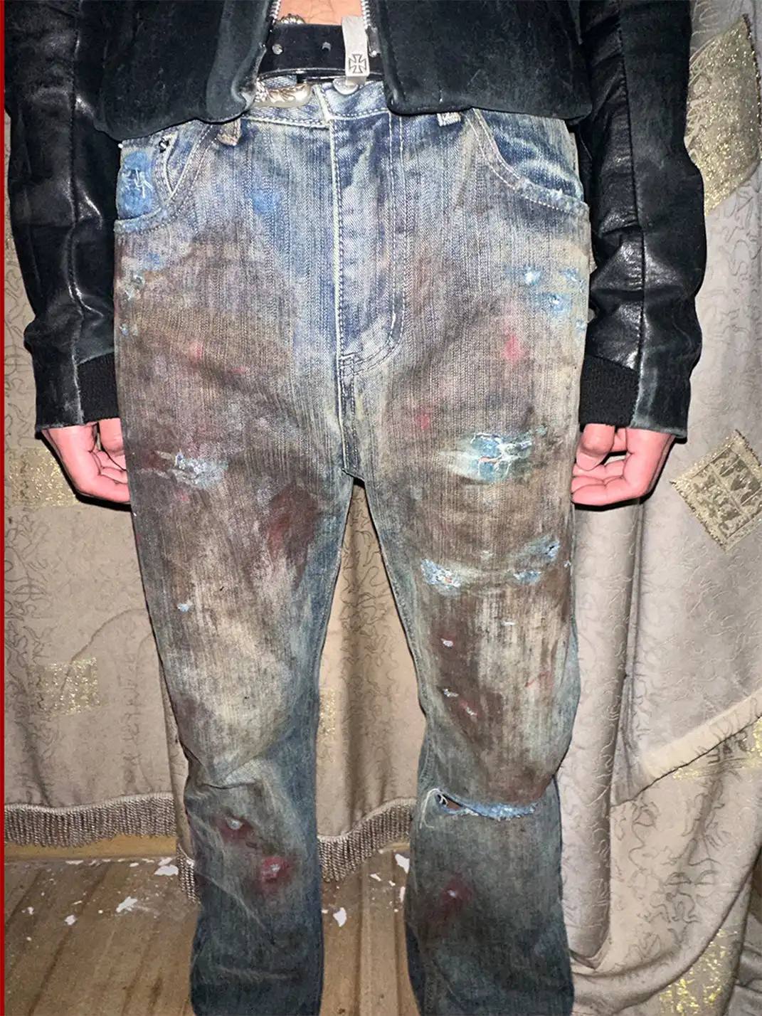 Laukerward | Bloodstained And Tattered Jeans By War Criminals