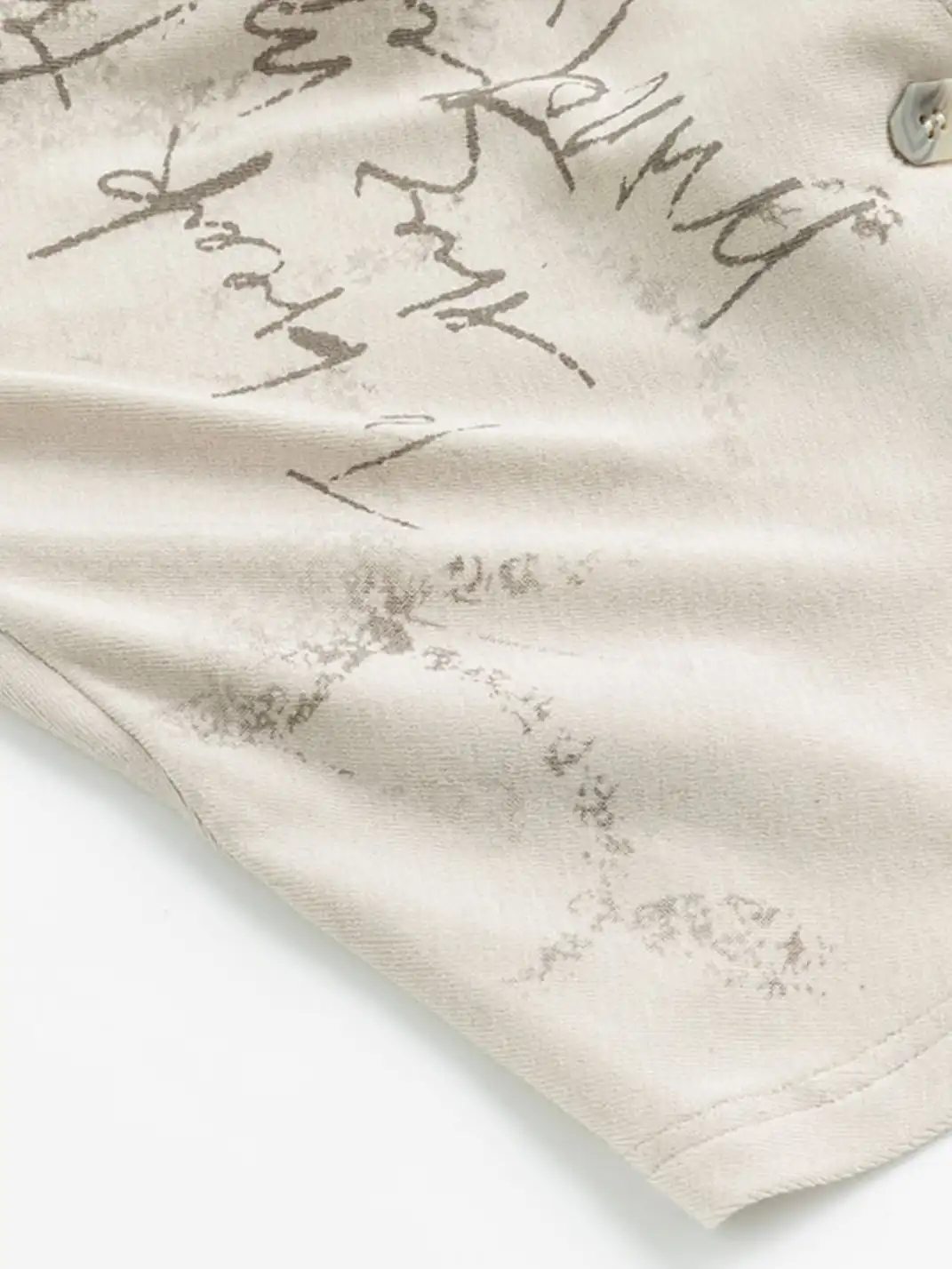 CestNous | Irregularly Mottled Graffiti-Covered Pleated Top