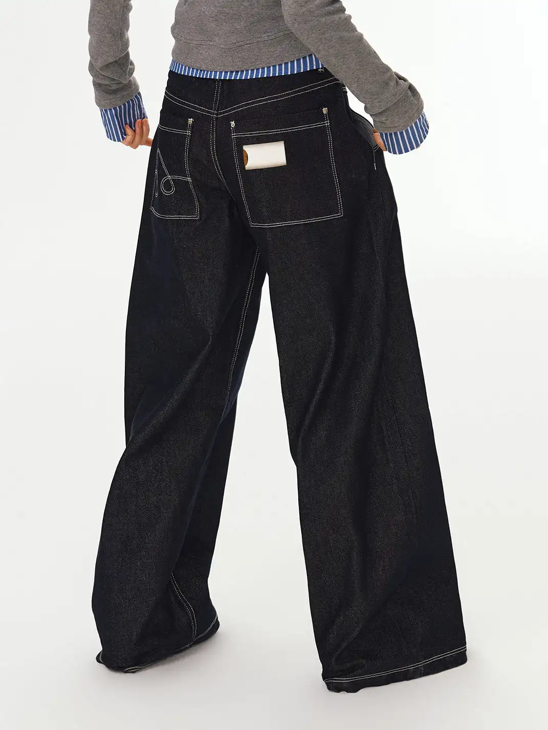 DeleteEX | Cut Silhouette Raw Denim Jeans