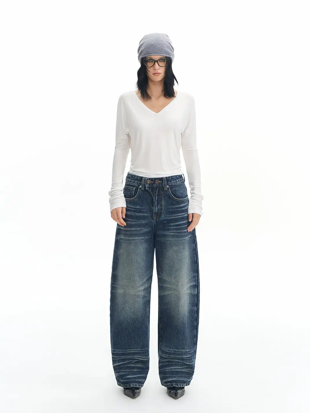 DeleteEX | Curved Washed Saucer Jeans