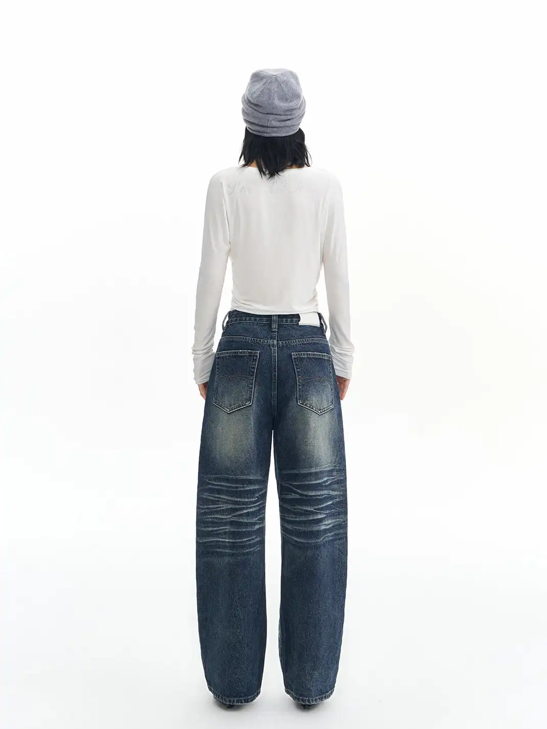 DeleteEX | Curved Washed Saucer Jeans