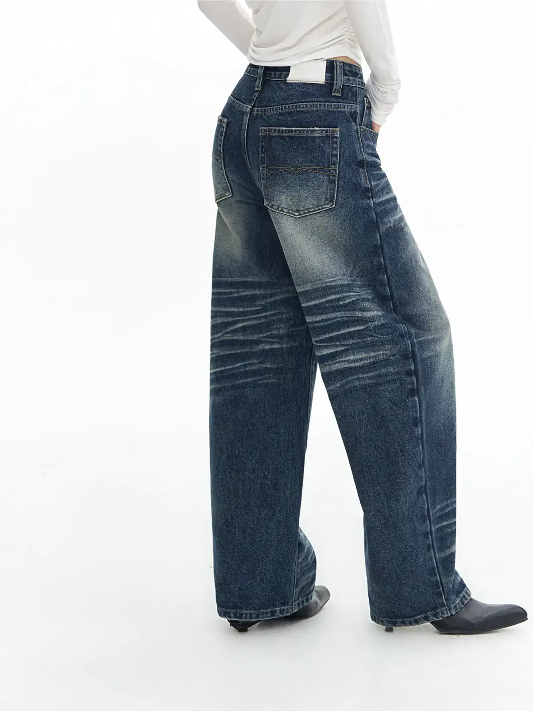 DeleteEX | Curved Washed Saucer Jeans