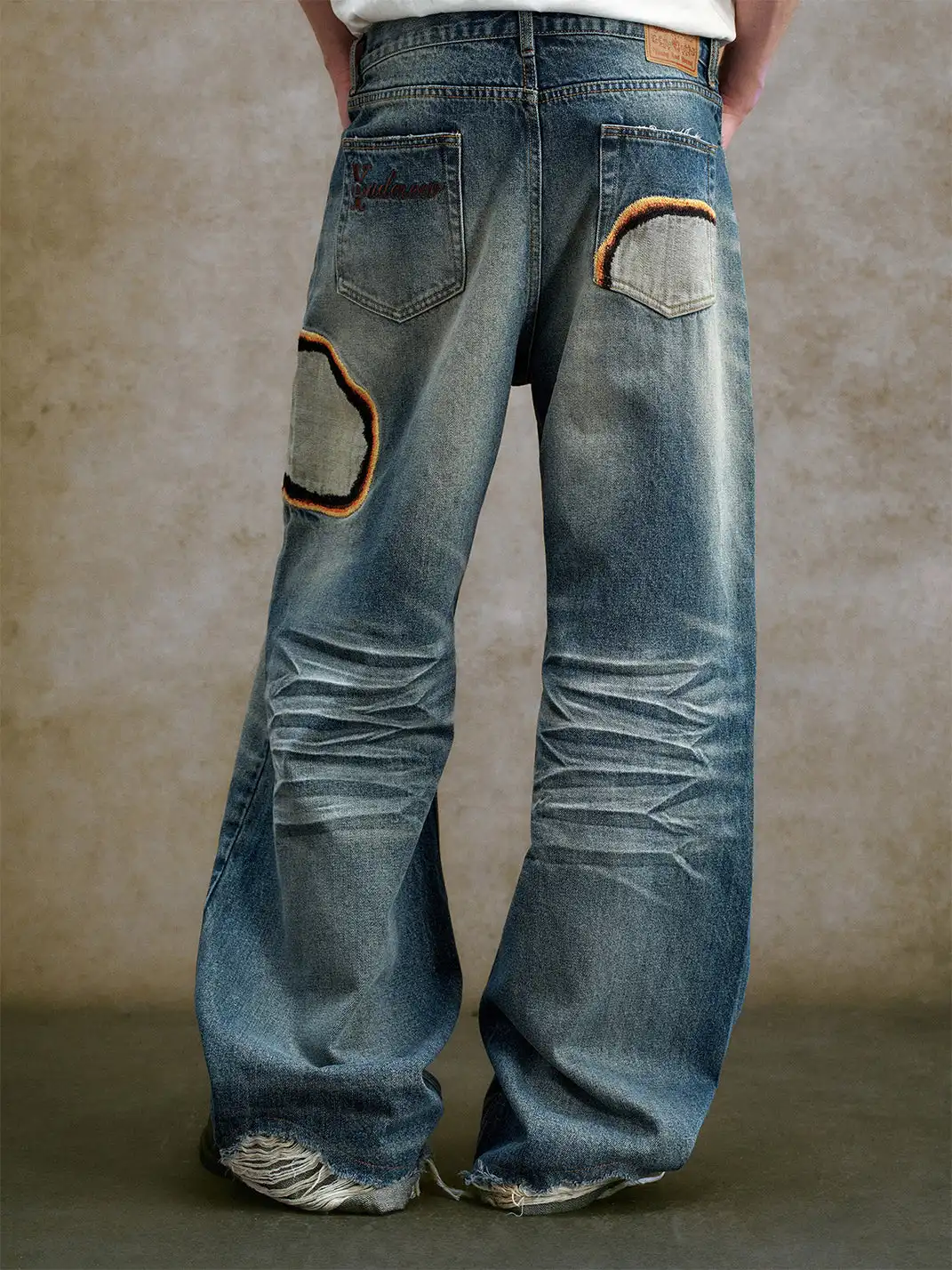 YADcrew | Embroidered Pleated Whiskered Jeans