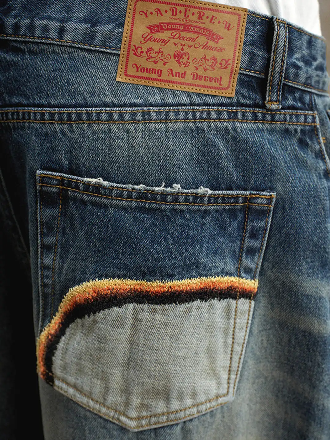 YADcrew | Embroidered Pleated Whiskered Jeans