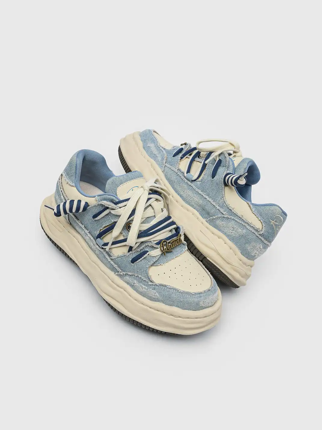 FGMM | Distressed Denim Wavy Sole Sneakers with Dual-Lace Design