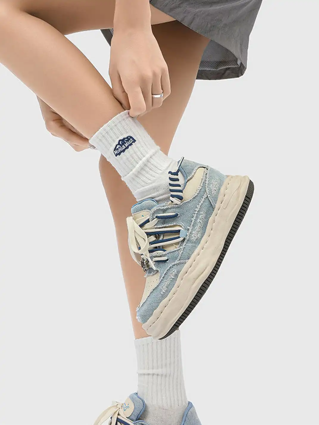 FGMM | Distressed Denim Wavy Sole Sneakers with Dual-Lace Design