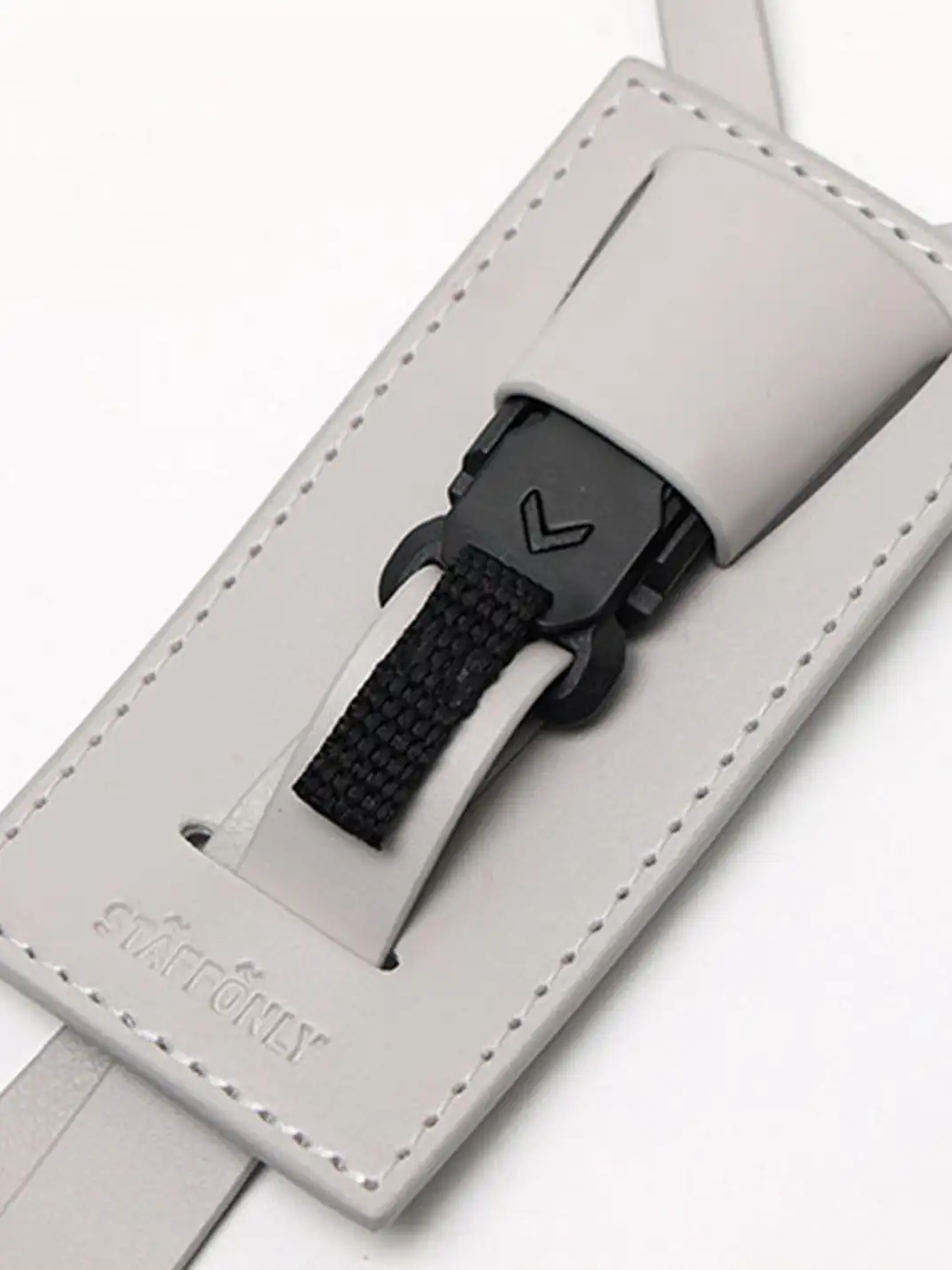 STAFFONLY | Four-Pointed Star Petal Embossed Logo Tie