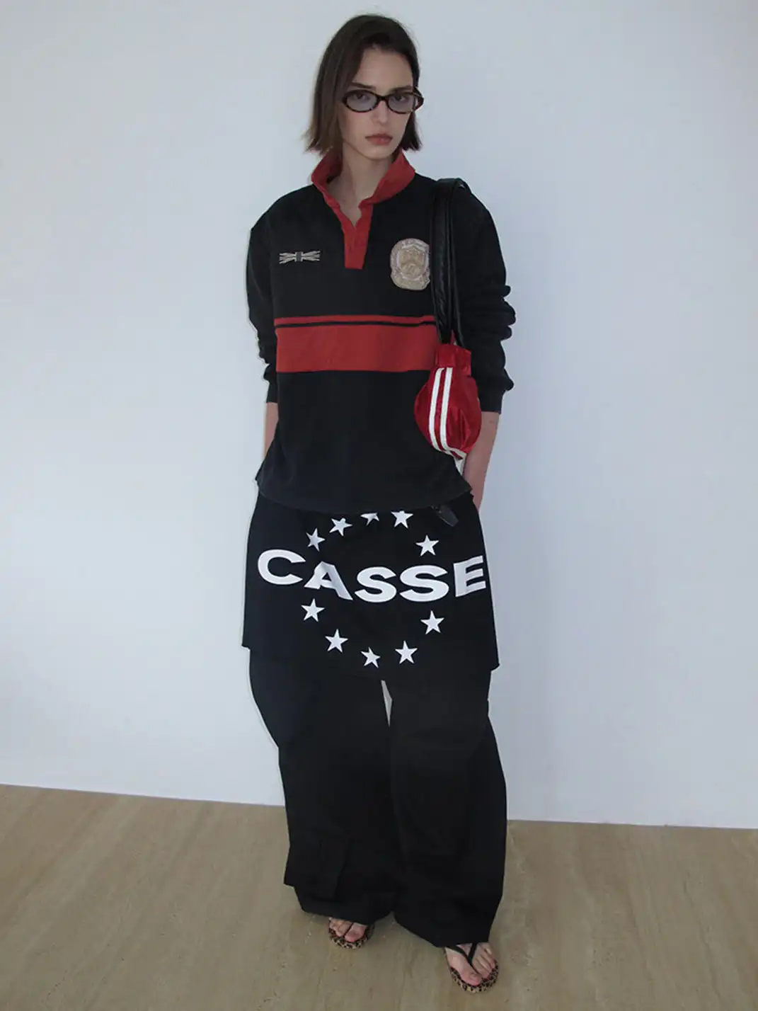 CasseSango | Diamond Quilted Color-Block Medal V-Neck Polo Shirt