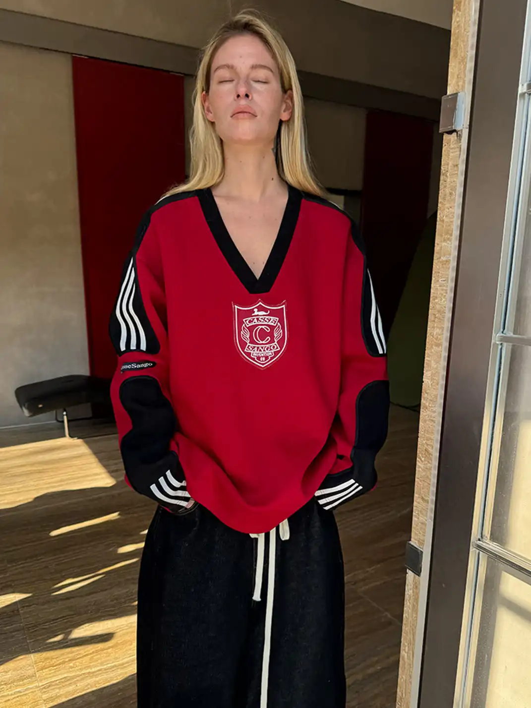 CasseSango | V-Neck Badge Striped Sports Sweatshirt