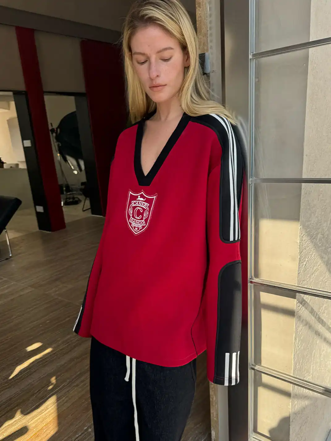 CasseSango | V-Neck Badge Striped Sports Sweatshirt