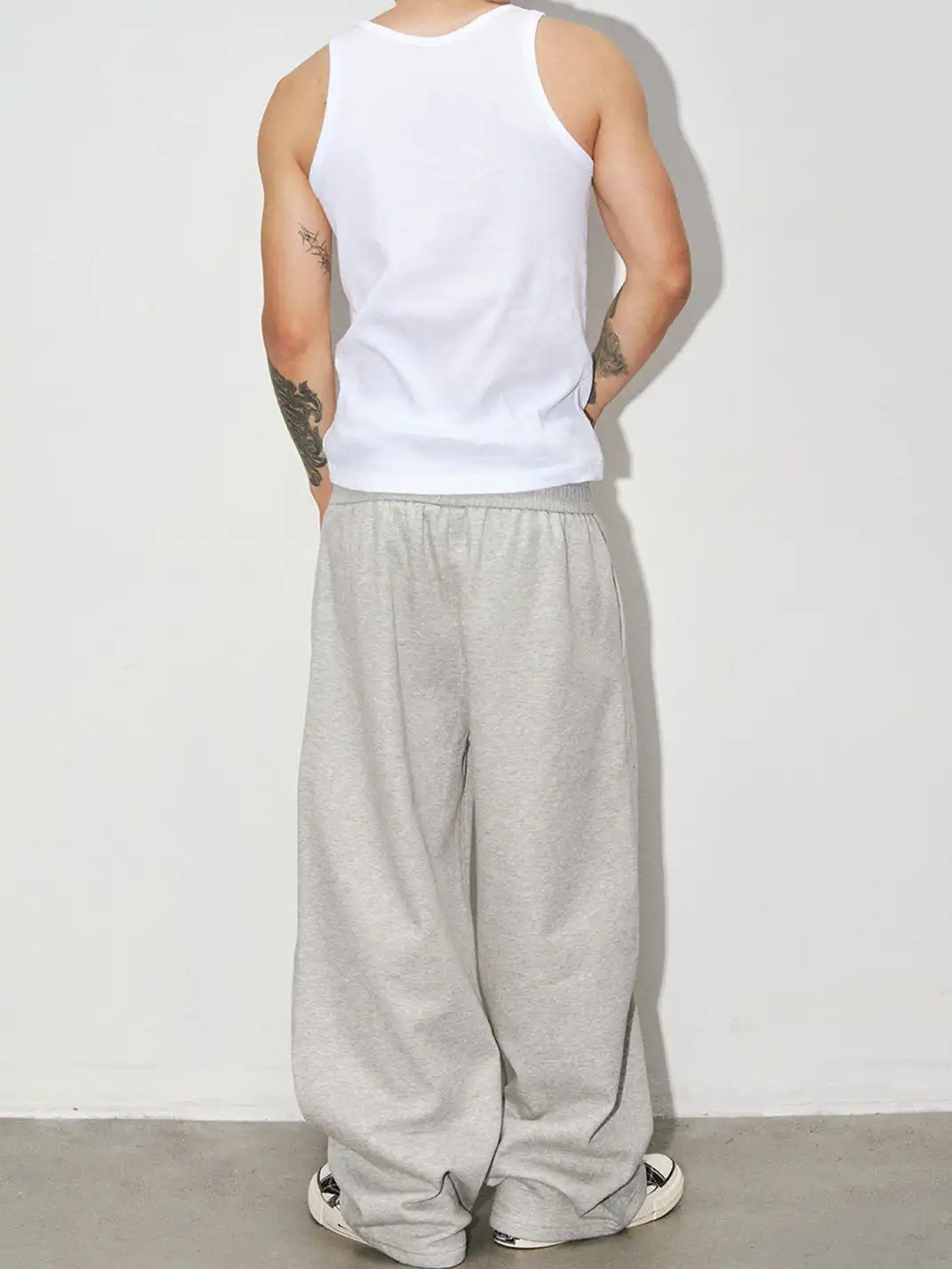 NOVACAM | Portrait Print Curved Wide-Leg Sweatpants