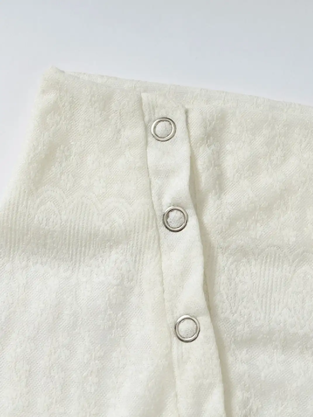 NO ROMANCE | Standing Collar Asymmetric Jacquard Knit Long Sleeve Top