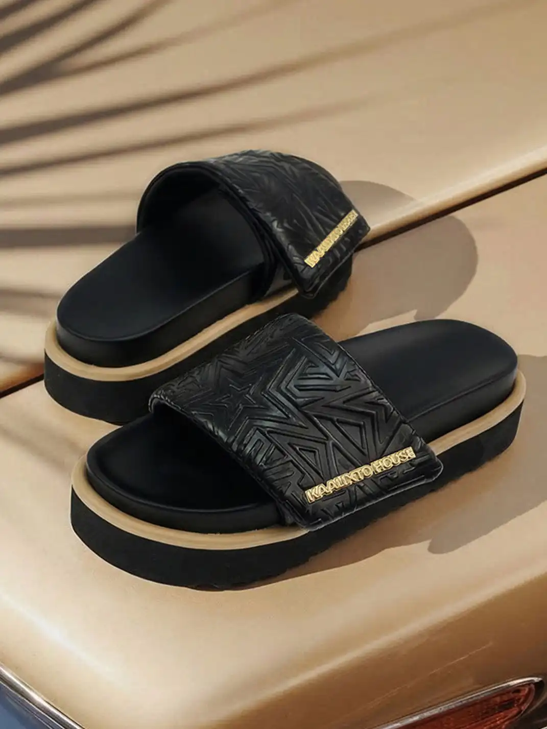 KAALIXTO | Embossed Logo Platform Slide Sandals