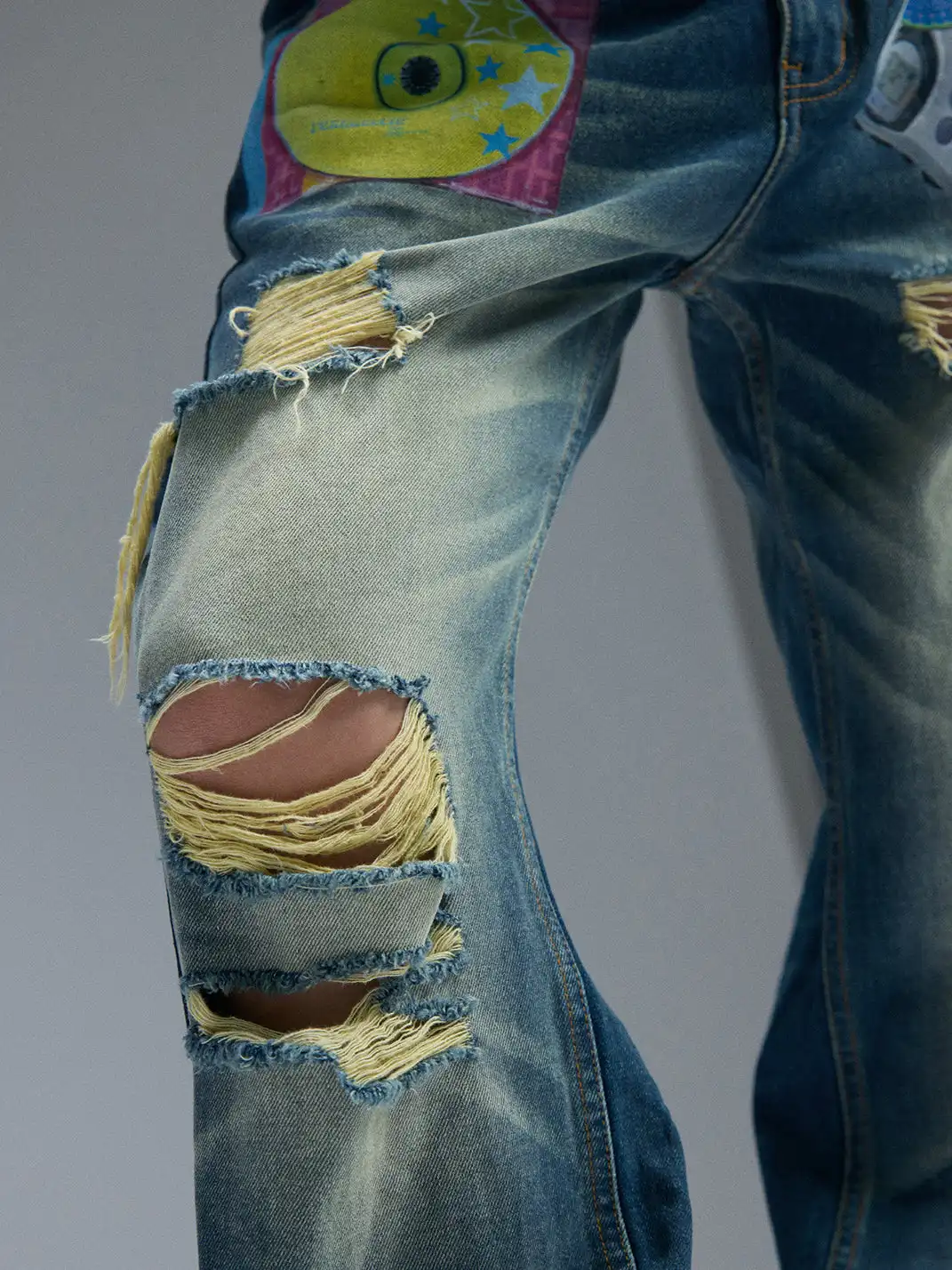 PAIKI | Ripped Yellow Mud Dyed Jeans