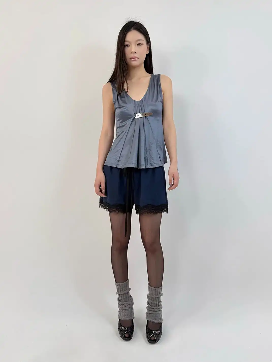 High river | Metal Buckle Ruched Satin-Textured Knit V-Neck Vest