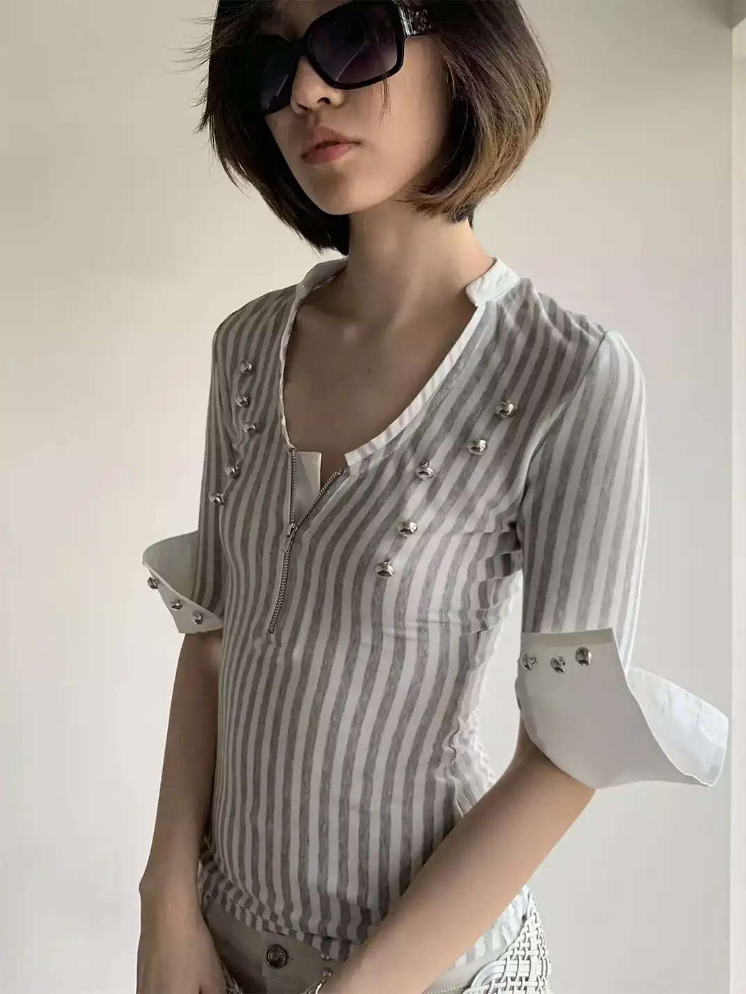 High river | Striped Knit Metal Buckle Mid-Sleeve Top
