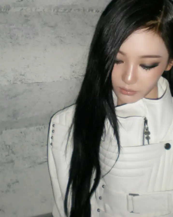 @imnotningning wearing ata nothingness jacket. Ningning is a member of the k-pop group aespa. Known for her distinctive street style and sharp allure, she has become a standout figure in today’s fashion scene. She is also a global ambassador for Gucci, embodying the rise of “succubus chic” with a cold, seductive energy. Check the same jacket on psylos1.com #ningning #succubuschic #streetwear #altfashion #psylos1 (2/5)