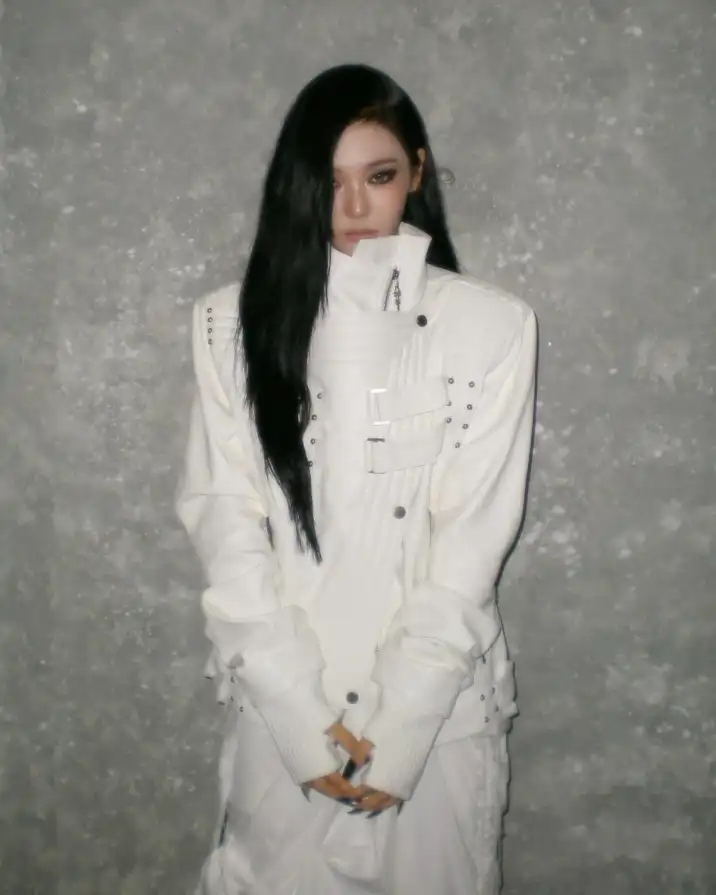 @imnotningning wearing ata nothingness jacket. Ningning is a member of the k-pop group aespa. Known for her distinctive street style and sharp allure, she has become a standout figure in today’s fashion scene. She is also a global ambassador for Gucci, embodying the rise of “succubus chic” with a cold, seductive energy. Check the same jacket on psylos1.com #ningning #succubuschic #streetwear #altfashion #psylos1 (1/5)