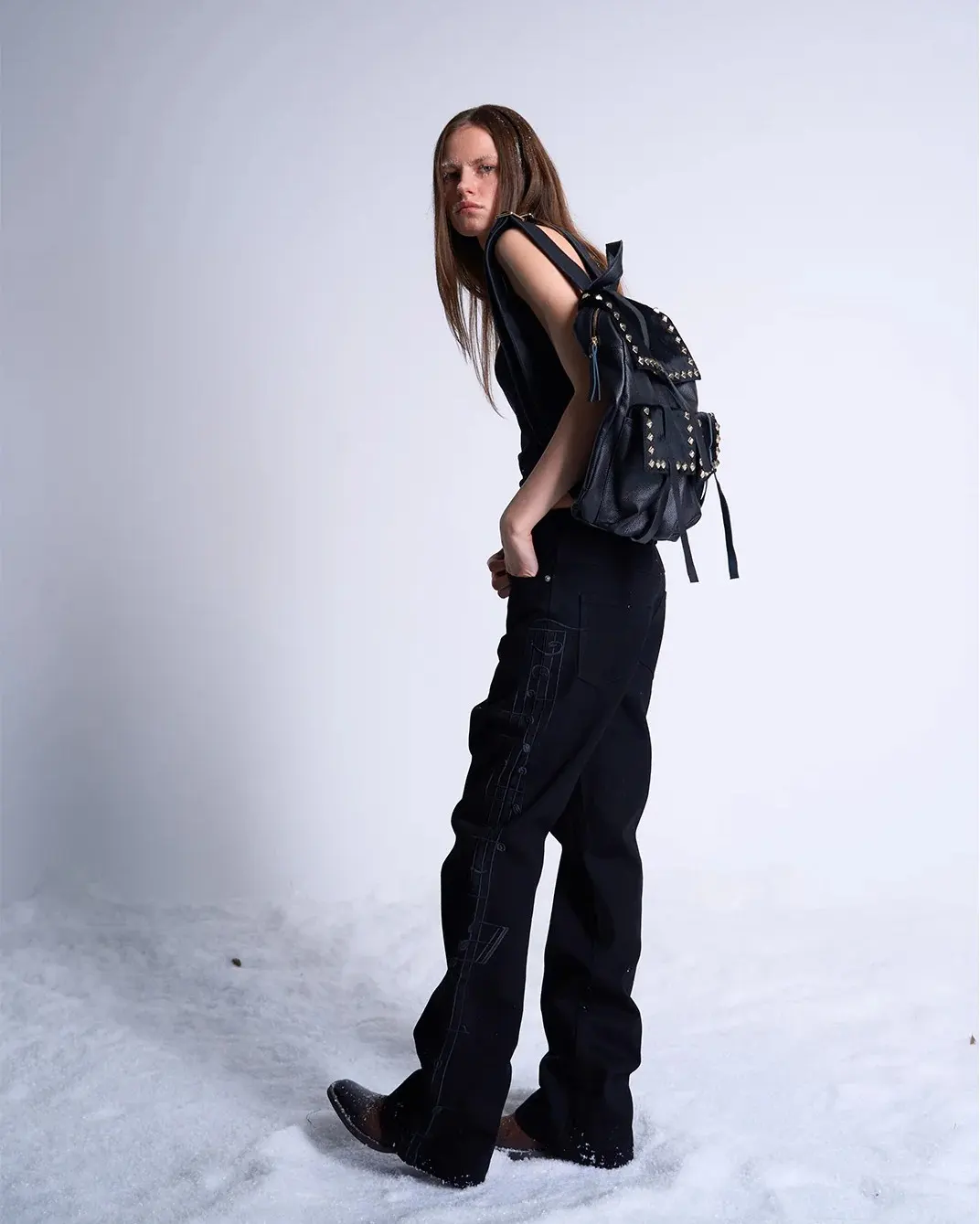 Frozen data in a white noise desert. Black leather spines protecting the payload from system failure. Secure the link at PSYLOS1.COM noEmosen #avantgardefashion #darkwear #studdedleather #futuristicstyle #noEmosen (2/5)