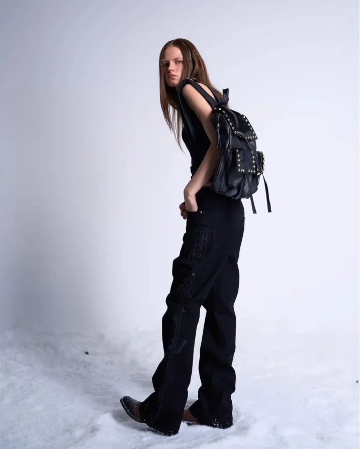 Frozen data in a white noise desert. Black leather spines protecting the payload from system failure. Secure the link at PSYLOS1.COM noEmosen #avantgardefashion #darkwear #studdedleather #futuristicstyle #noEmosen (2/5)