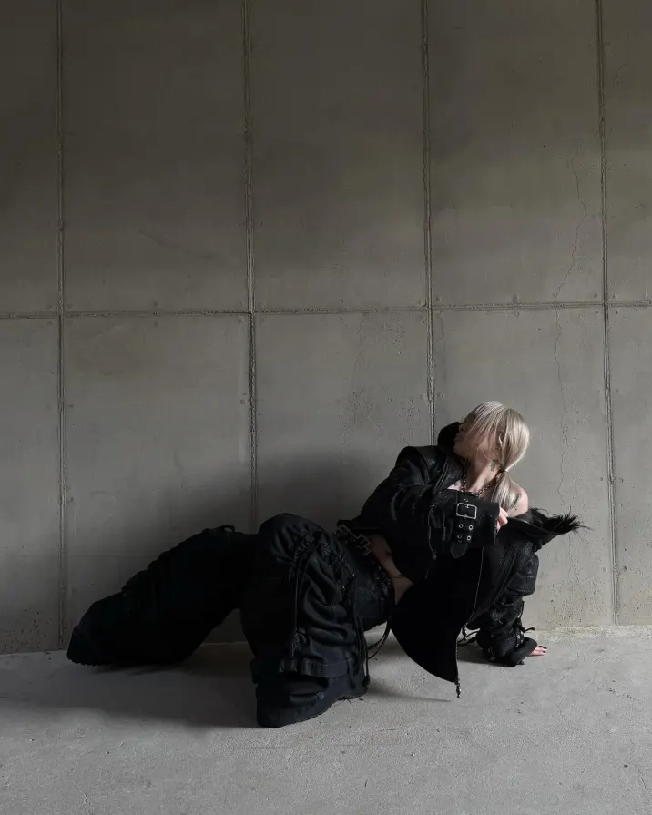 Heavy black straps. Soft fur lining. Become the main character of your own dystopia. ATA NOTHINGNESS Shop the drop via link in bio. #darkfashion #edgystyle #leatherjacket #streetgoth (4/5)