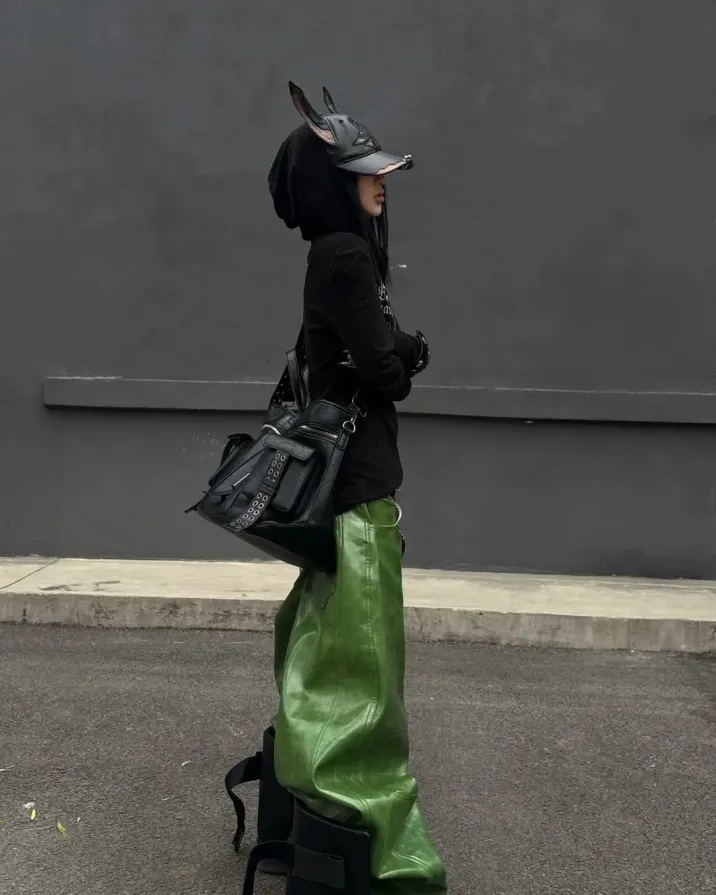 Entropy is the ultimate aesthetic. Shatter the algorithm in these Liquid Metal Coated Wax Pants. Secure your armor at PSYLOS1.COM REBEL WAVE | Liquid Metal Coated Wax Pants Flared Jeans REBEL WAVE丨"╋" Cracked Leather Rivet Belt REBEL WAVE | Cross Pattern Cracked PU Leather Tote Bag #GlitchCore #RebelWave #AvantGarde #Streetwear (2/6)