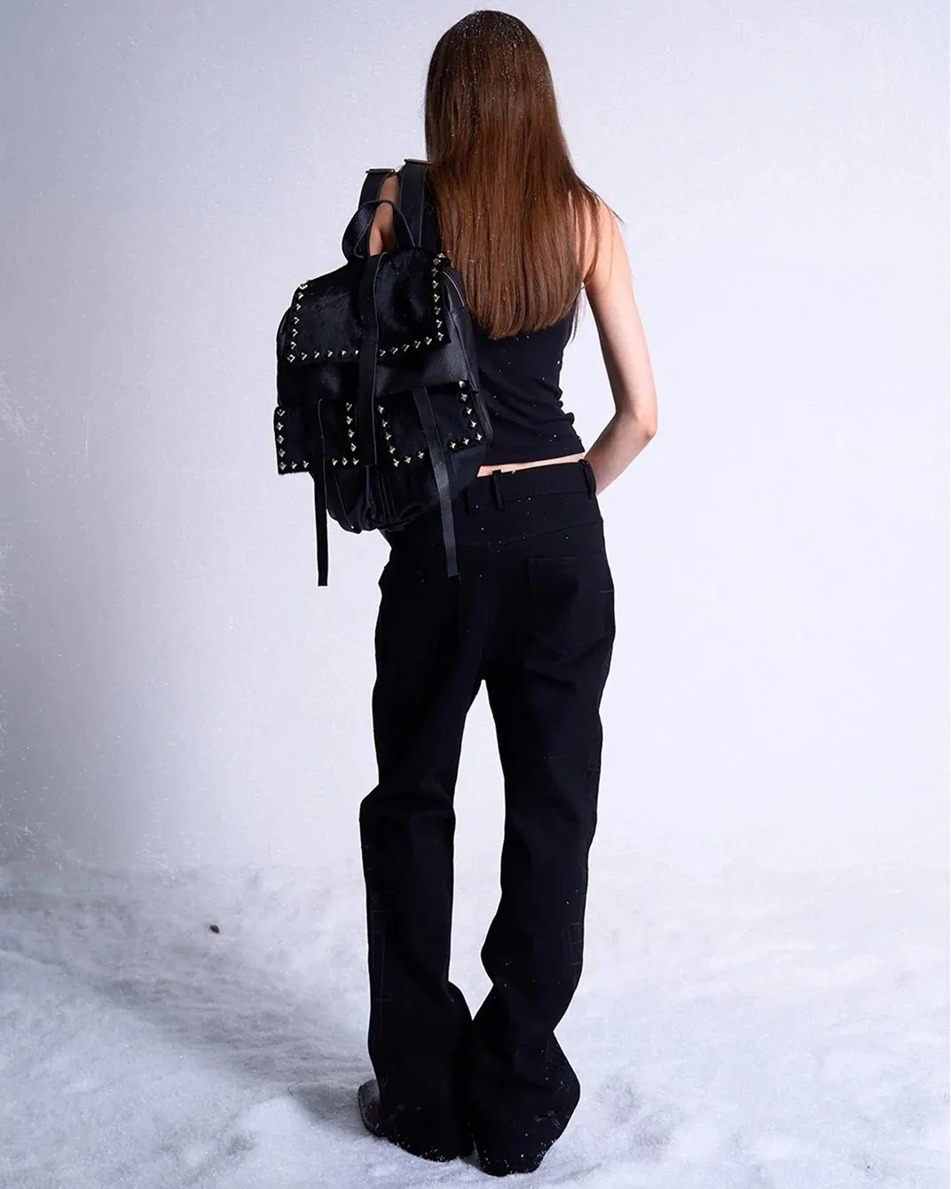 Frozen data in a white noise desert. Black leather spines protecting the payload from system failure. Secure the link at PSYLOS1.COM noEmosen #avantgardefashion #darkwear #studdedleather #futuristicstyle #noEmosen (3/5)