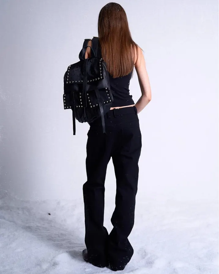 Frozen data in a white noise desert. Black leather spines protecting the payload from system failure. Secure the link at PSYLOS1.COM noEmosen #avantgardefashion #darkwear #studdedleather #futuristicstyle #noEmosen (3/5)