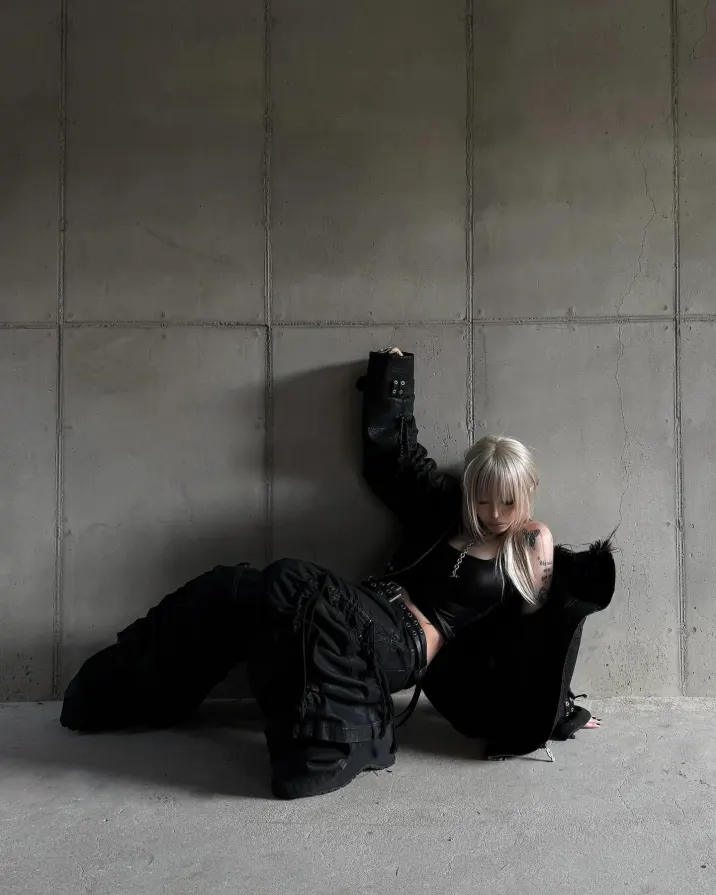 Heavy black straps. Soft fur lining. Become the main character of your own dystopia. ATA NOTHINGNESS Shop the drop via link in bio. #darkfashion #edgystyle #leatherjacket #streetgoth (2/5)