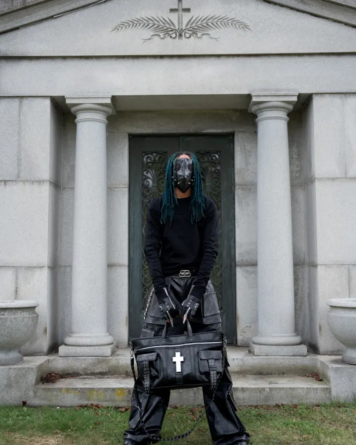 Crosses carved in cracked leather, like armor from a city that never sleeps. A tote built for the ones who move with noise. Carry the chaos at psylos1.com #REBELWAVE #psylos1 #streetavantgarde #industrialstyle #darkfashion (4/5)