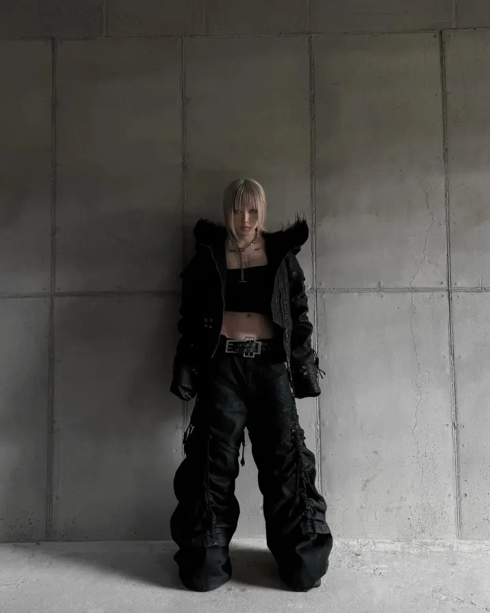 Heavy black straps. Soft fur lining. Become the main character of your own dystopia. ATA NOTHINGNESS Shop the drop via link in bio. #darkfashion #edgystyle #leatherjacket #streetgoth (5/5)