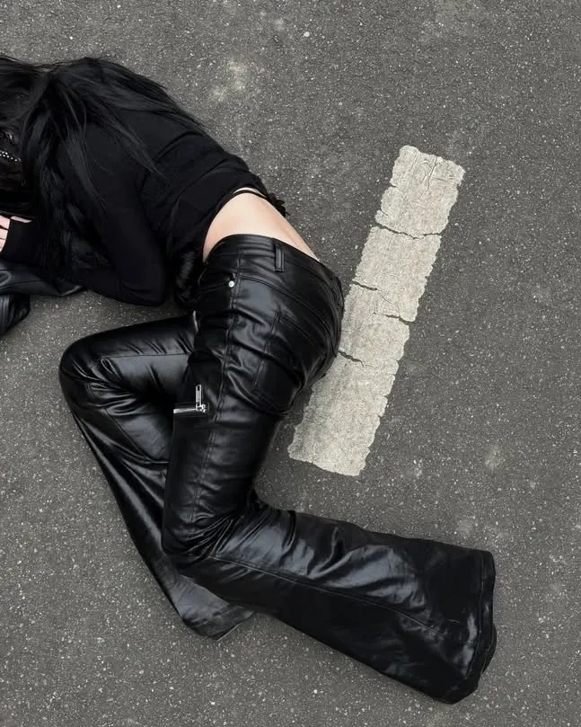 Reality fractures when you wear the noise. Disrupt the silence with heavy metal aesthetics. Claim your armor at PSYLOS1.COM REBEL WAVE | Liquid Metal Coated Wax Pants Flared Jeans #CyberPunk #IndustrialFashion #RebelWave #DarkAesthetic (3/7)
